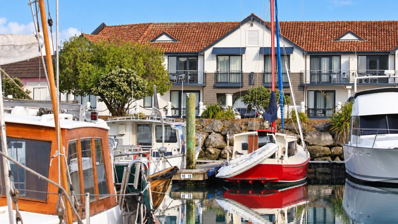 View through the marina to the front of Harbourside Nelson