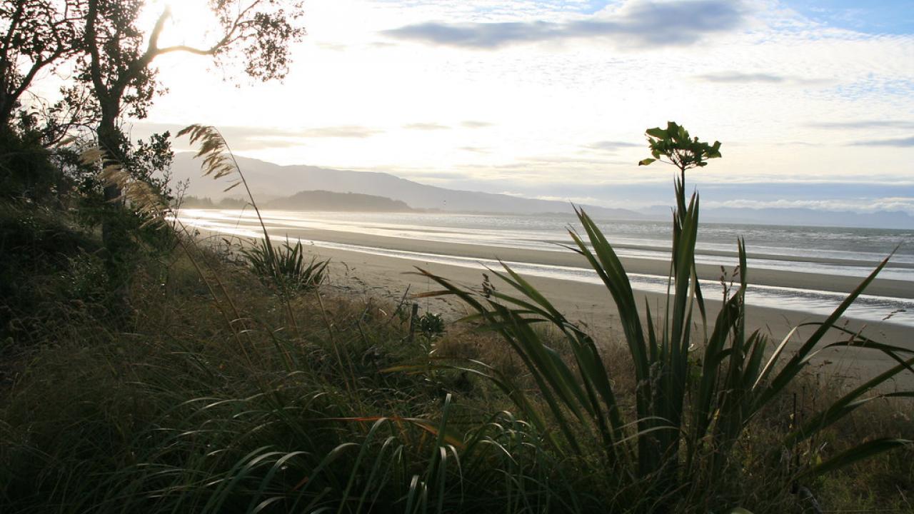 Sunset over a beautiful bay in the Abel Tasman National Park