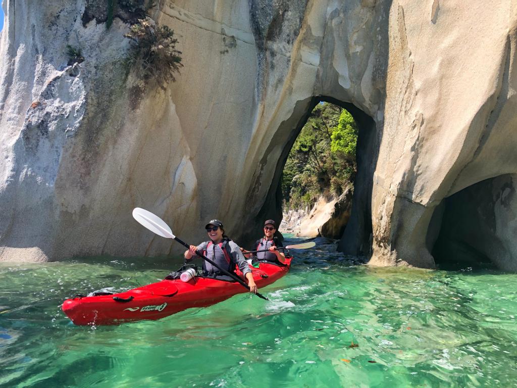 Rock cave kayaking in the Abel Tasman