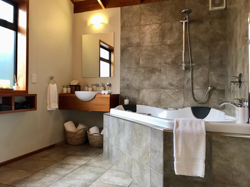 Villa bathroom with double hydrotherapy spa, italian tiles and underfloor heating.