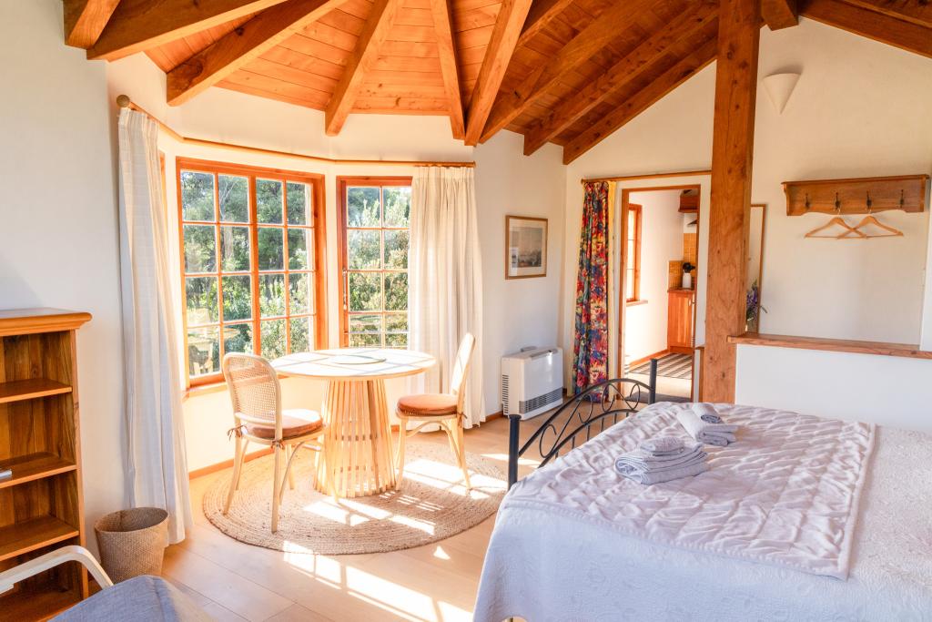 Sun-filled alcove with stunning views of the surrounding nature, bird sanctuary, and the Pacific Ocean. Simone Jackson