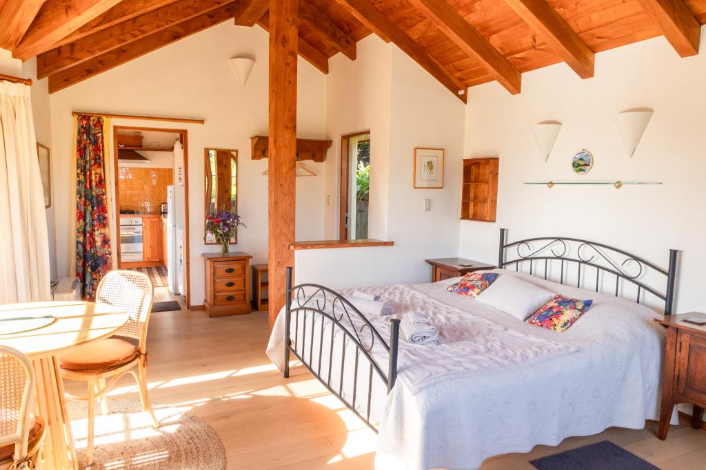The nature-themed interior accommodates up to two guests and features a cosy king-sized bed dressed in natural linens. Simone Jackson