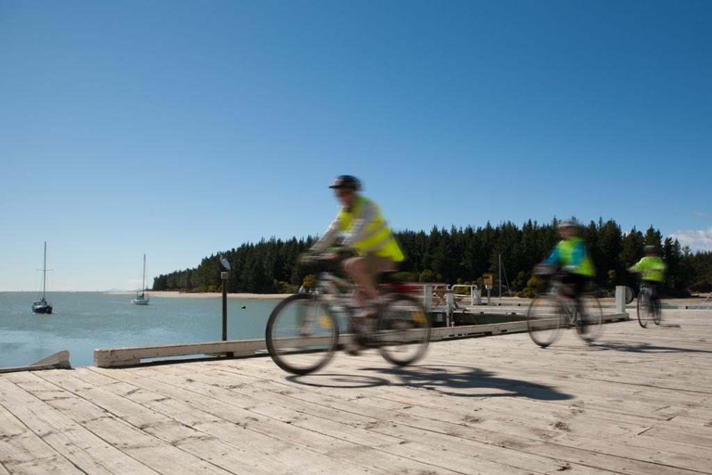 Cyclists on Mapua Wharf